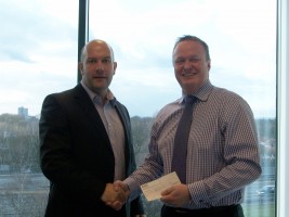 Joey Allen, Managing Director of CARA Brickwork presenting cheque for £500.00 to Steve Jackson, Dir